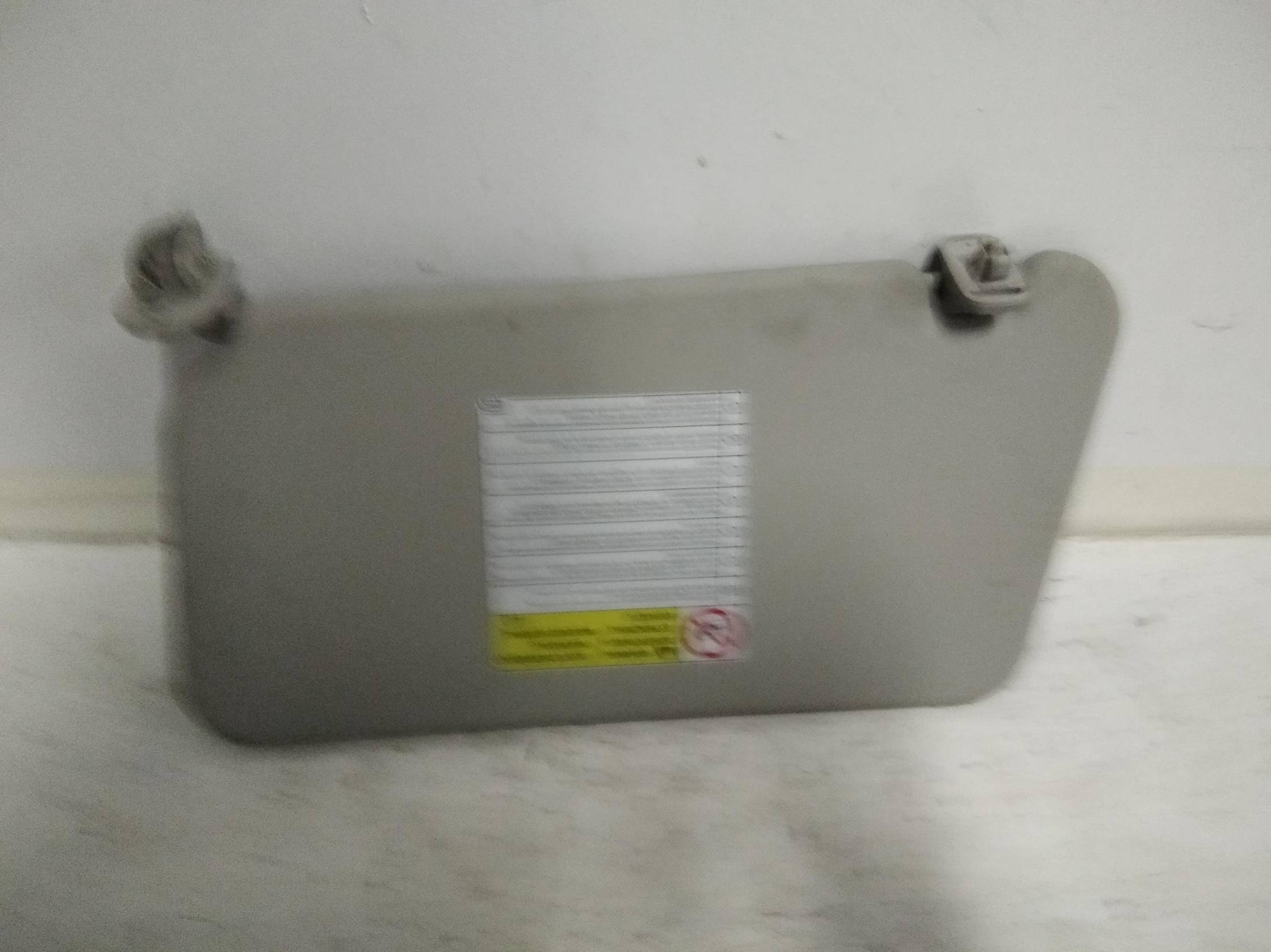 Aletta parasole parabrezza dx.